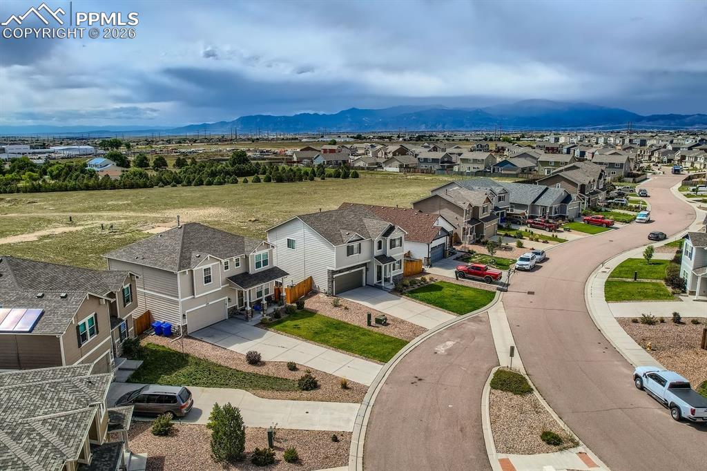 11329 Avena Road Peyton, CO 80831 - Photo 40 of 42 an aerial view of a house with a garden