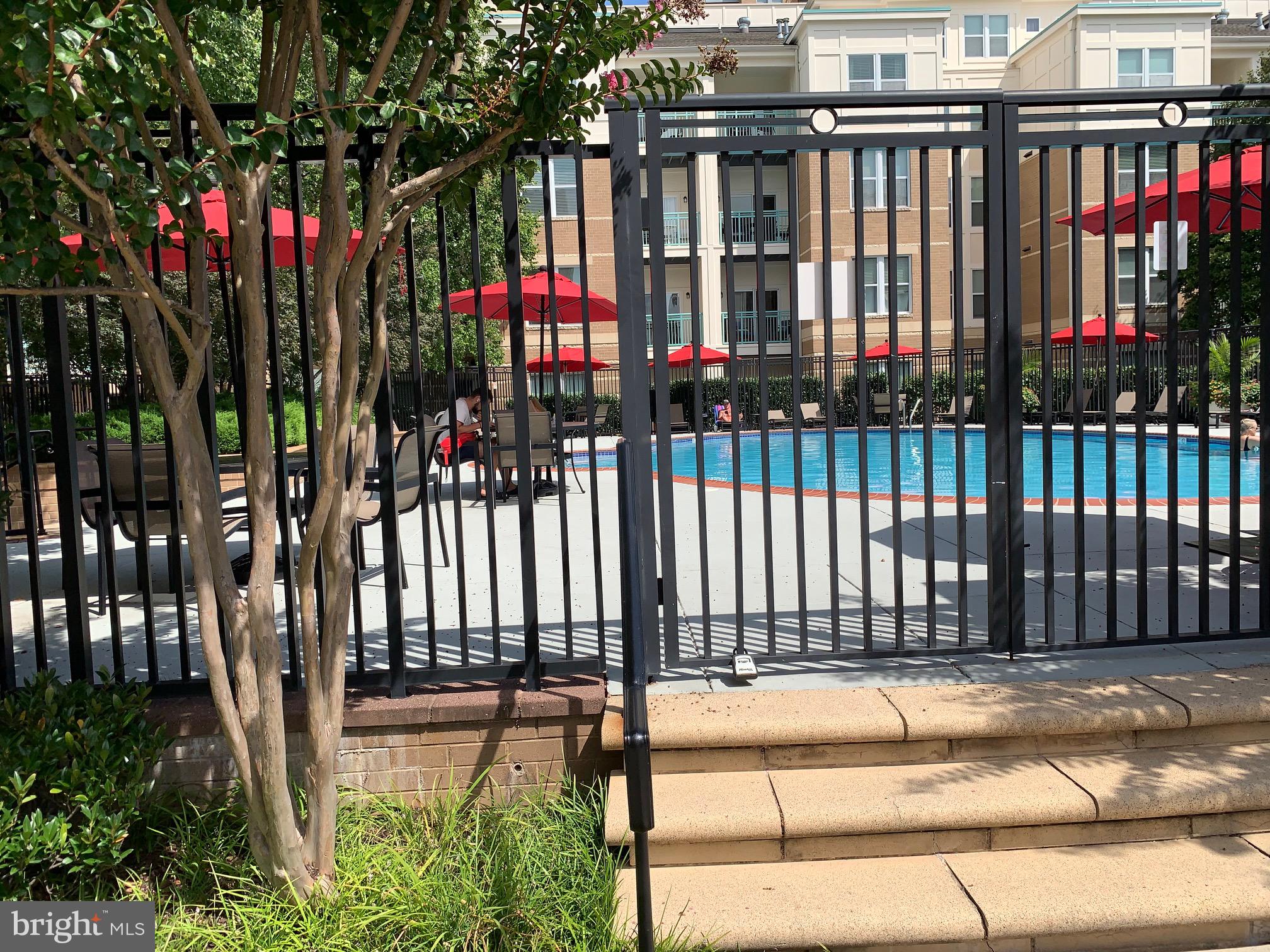 12000 Market Street, Unit 483 Reston, VA 20190 - Photo 11 of 36 The pool in the interior courtyard by the gazebo.