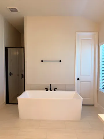 a bathroom with a bathtub