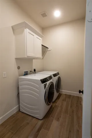 a storage room with washer and dryer