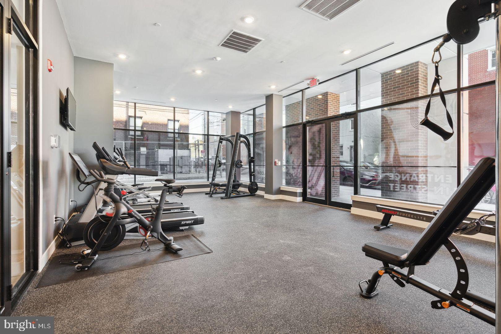 720 West Thompson Street, Unit 1B208 Philadelphia, PA 19122 - Photo 18 of 32 a view of a room with gym equipment