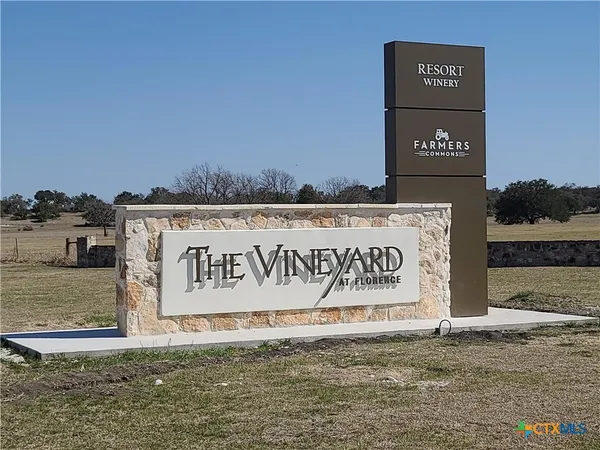 a sign that is on the side of a building