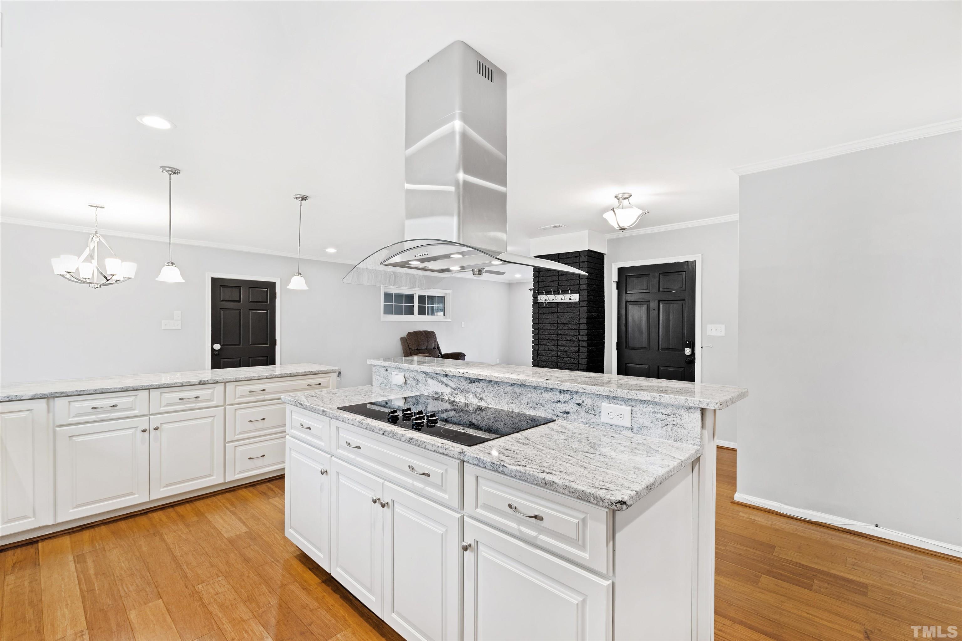 2528 Optimist Farm Road Apex, NC 27539 - Photo 21 of 49 a kitchen with stainless steel appliances granite countertop a stove and a sink