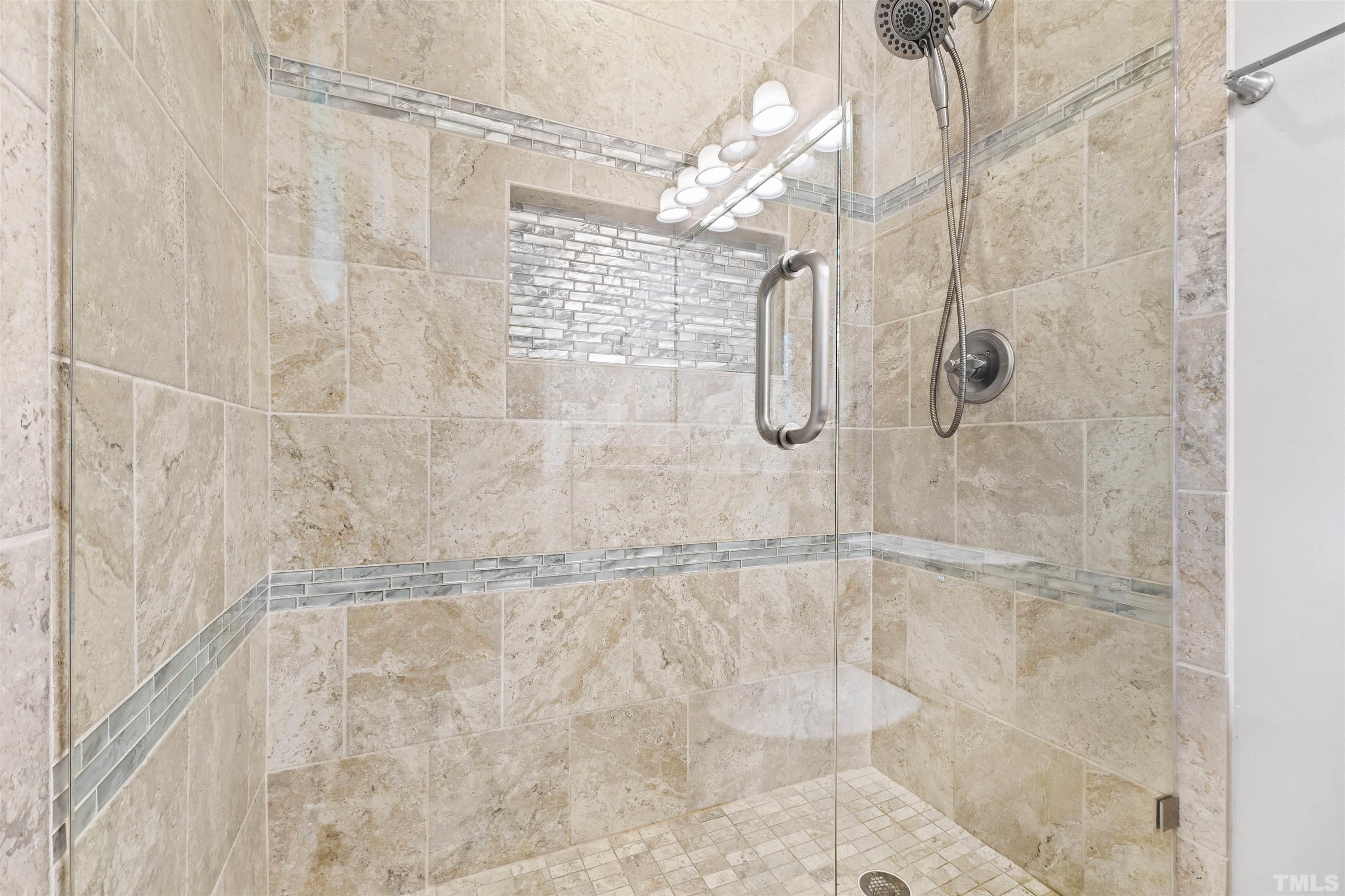 2528 Optimist Farm Road Apex, NC 27539 - Photo 31 of 49 a bathroom with a shower