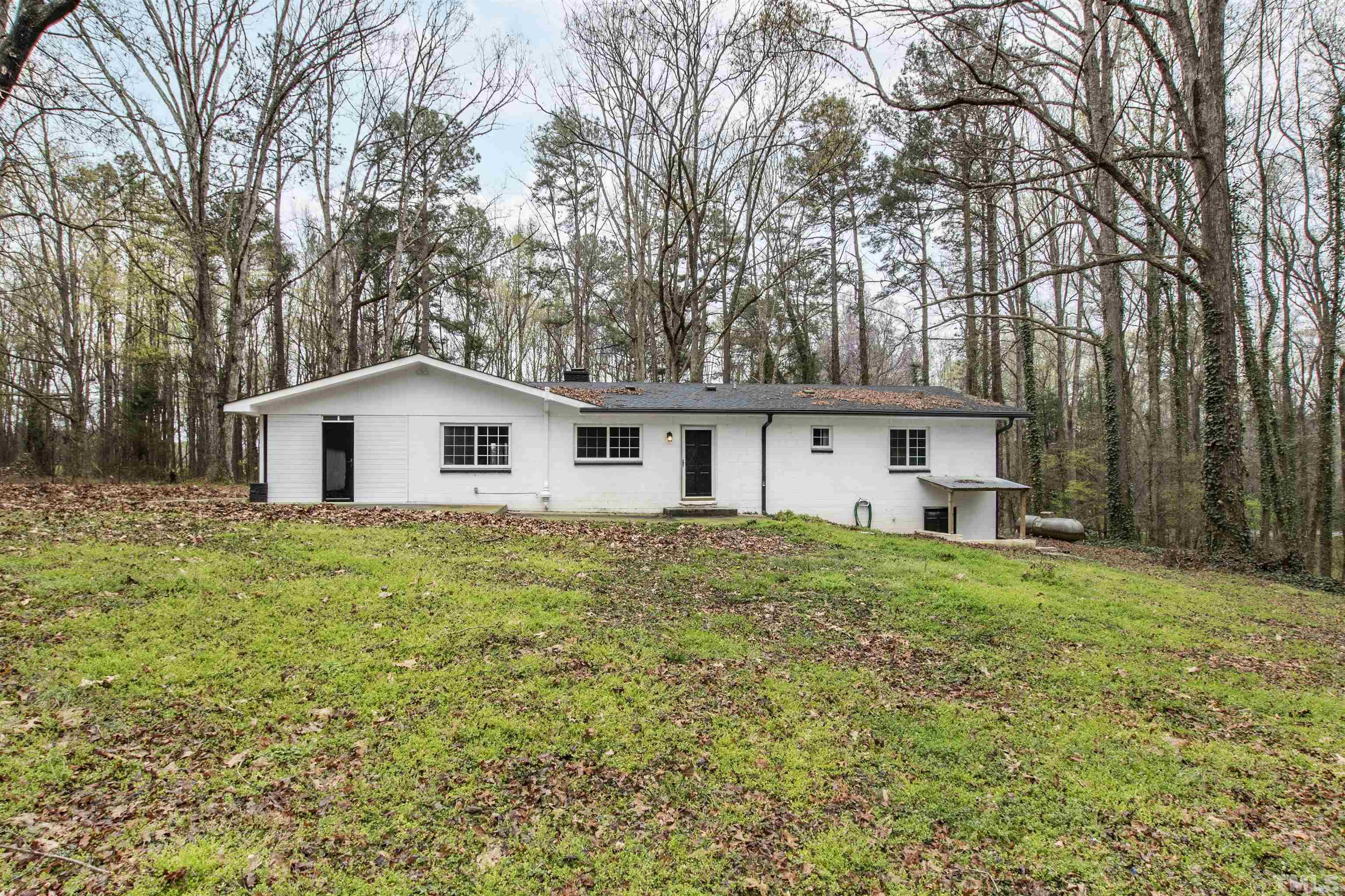 2528 Optimist Farm Road Apex, NC 27539 - Photo 47 of 49 a view of house with a yard