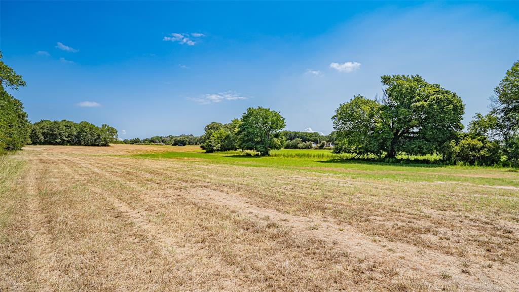 13345 Briar Road Azle, TX 76020 - Photo 19 of 26 View of grassy yard with a view of rural / pastoral area