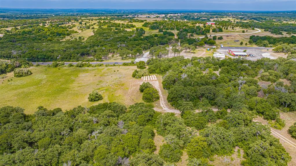 13345 Briar Road Azle, TX 76020 - Photo 25 of 26 Aerial view of property and surrounding area with a forest