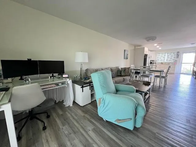 a kitchen with a sink stove and refrigerator