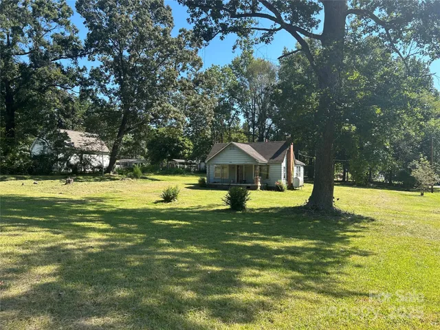 a view of a house with a swimming pool