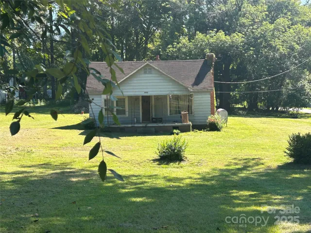 a house with yard in front of it
