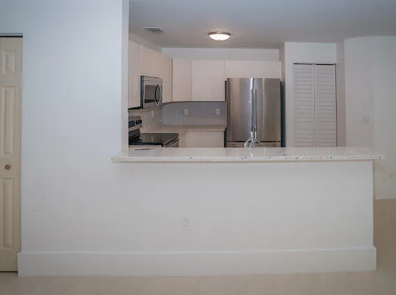 a bathroom with a bathtub and a sink