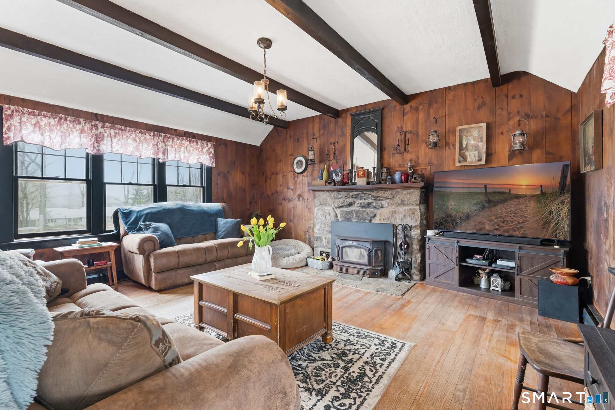 298 Kenyon Road Morris, CT 06763 - Photo 12 of 32 Living Room w/ wood insert-heats the entire home all winter