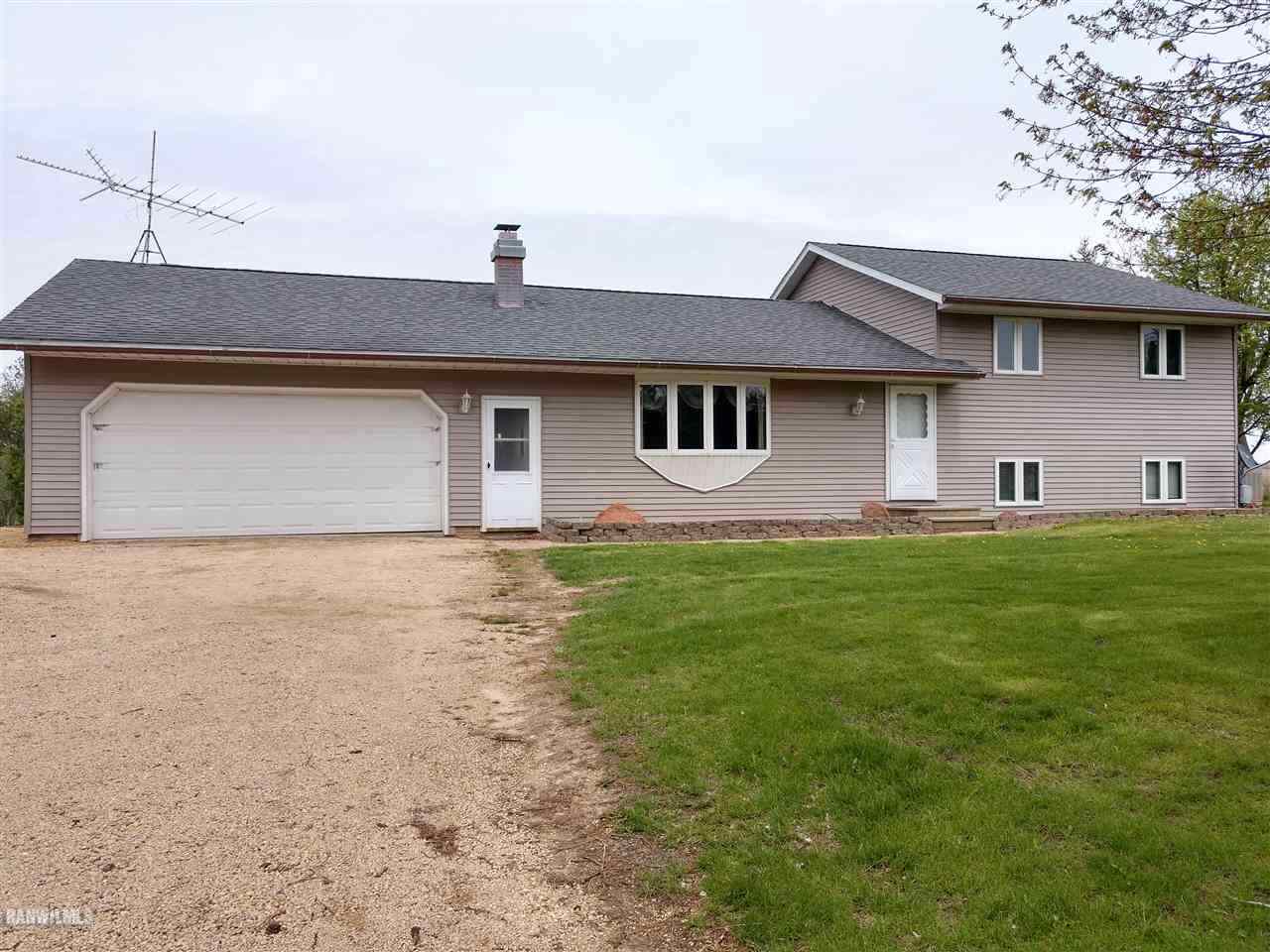 19431 Thomson Road Chadwick, IL 61014 - Photo 19 of 19 a front view of house with yard