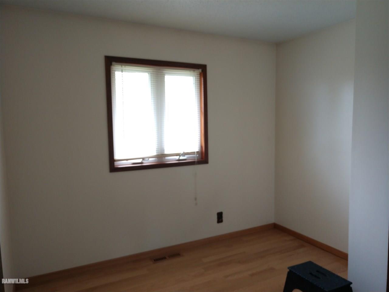 19431 Thomson Road Chadwick, IL 61014 - Photo 4 of 19 an empty room with a window