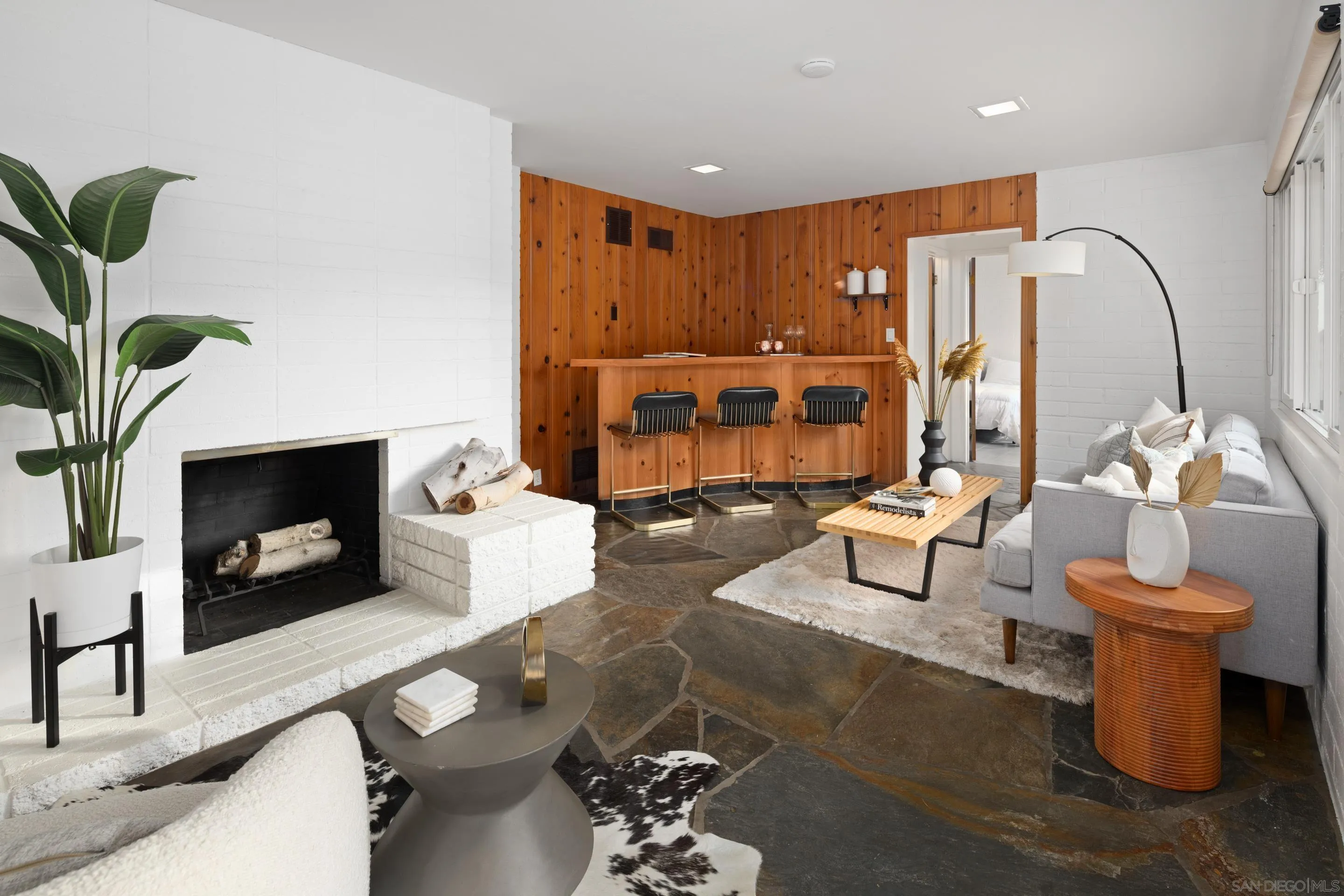 9560 Starlight Lane La Mesa, CA 91941 - Photo 11 of 18 a living room with furniture and a fireplace