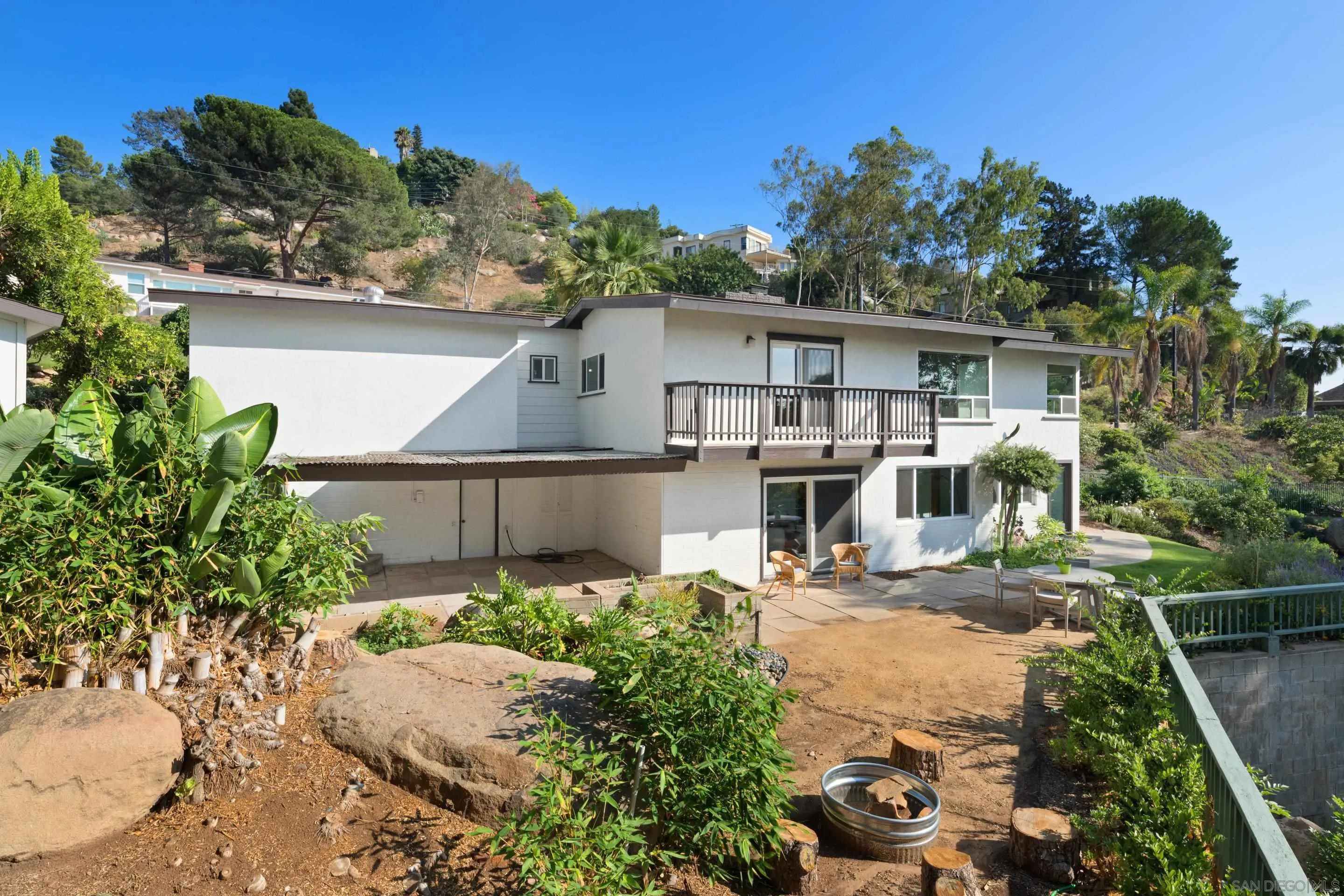 9560 Starlight Lane La Mesa, CA 91941 - Photo 16 of 18 a front view of a house with a yard