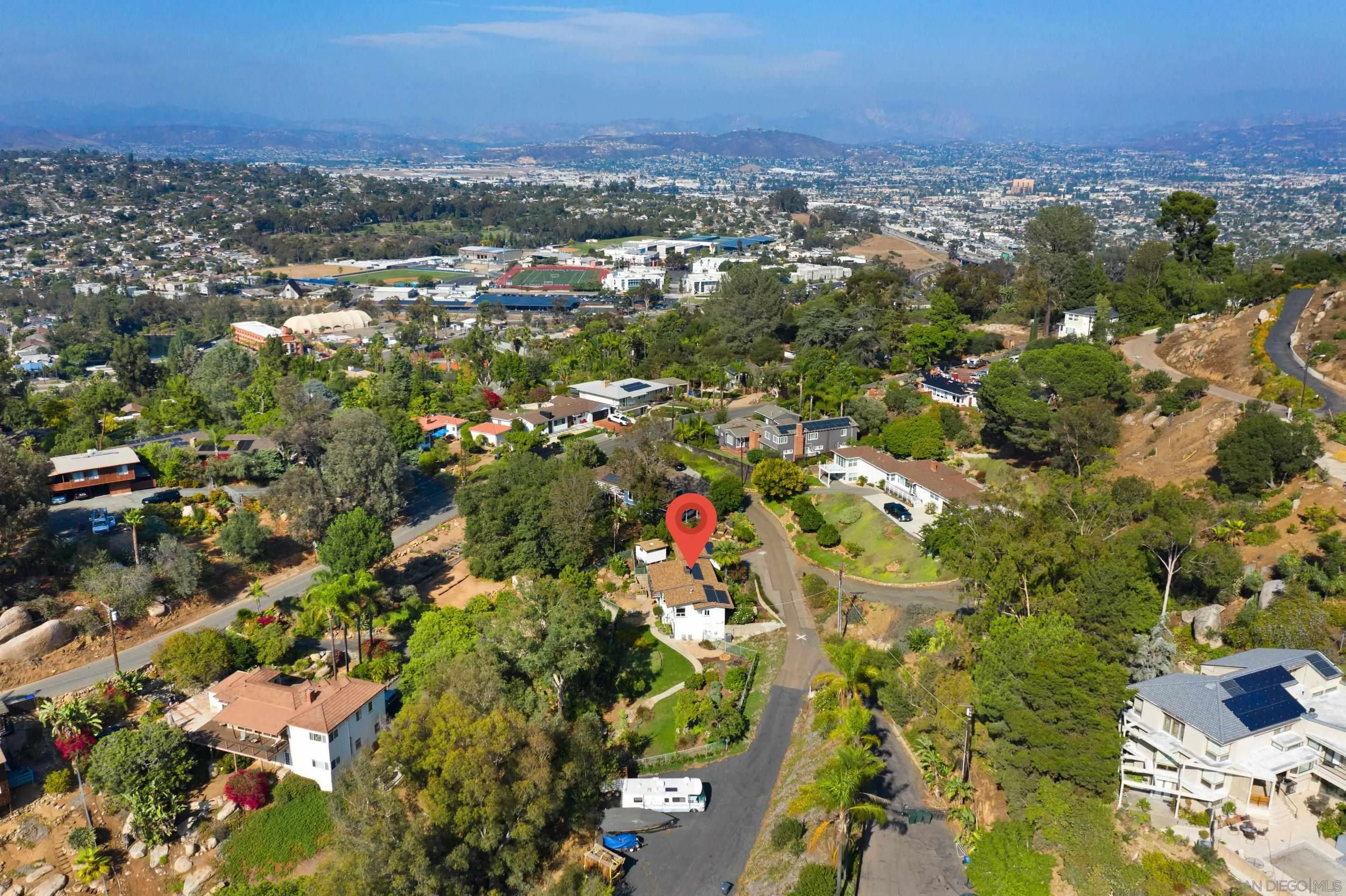 9560 Starlight Lane La Mesa, CA 91941 - Photo 17 of 18 an aerial view of residential houses with outdoor space and trees