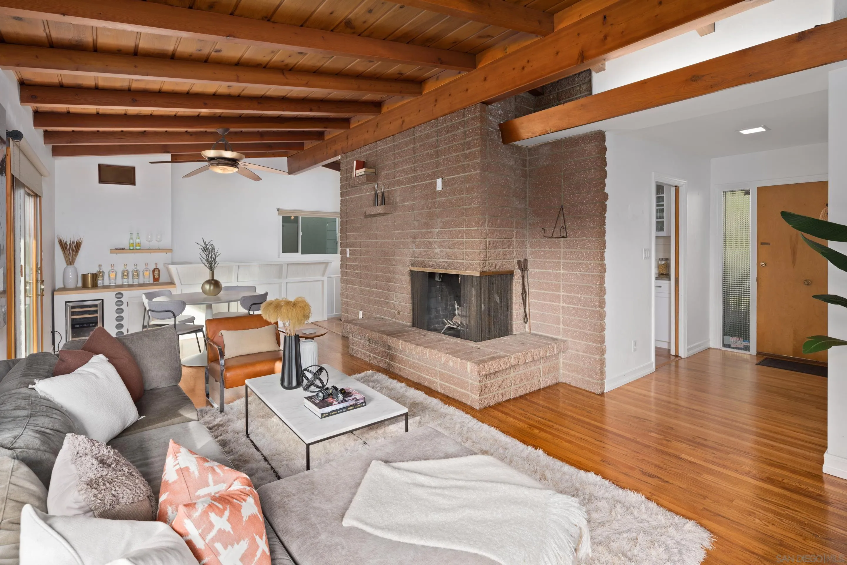 9560 Starlight Lane La Mesa, CA 91941 - Photo 4 of 18 a living room with furniture and a fireplace