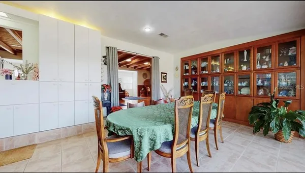 a view of yard with patio