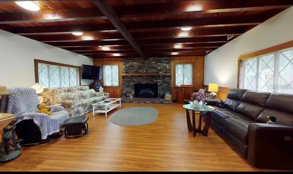 a view of a living room and dining room