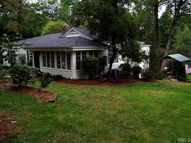2717 Wilson Lane Raleigh, NC 27609 - Photo 1 of 1 a view of a house with backyard and garden