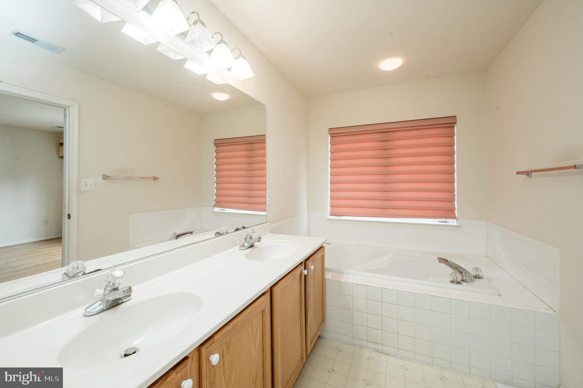 9011 Fox Park Road Clinton, MD 20735 - Photo 14 of 25 Master Bedroom with soaking tub