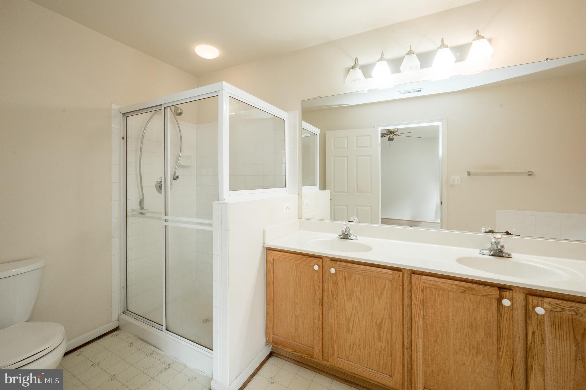 9011 Fox Park Road Clinton, MD 20735 - Photo 15 of 25 Master Bedroom with shower