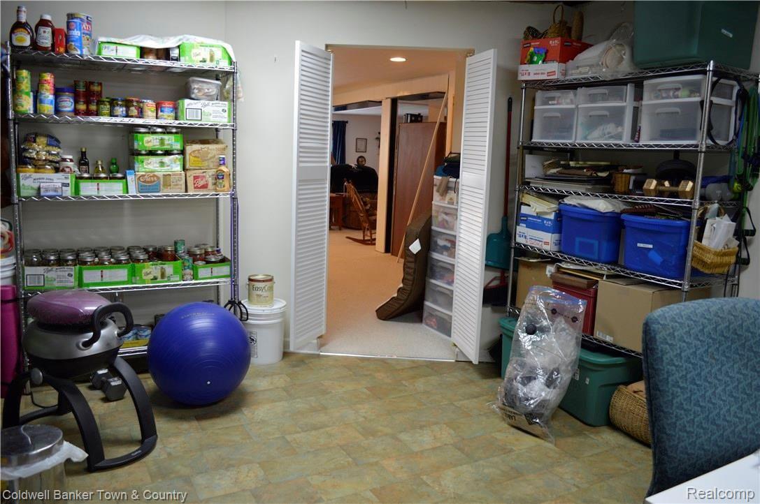 9797 Van Buren Road Fowlerville, MI 48836 - Photo 49 of 56 LAUNDRY/STORAGE IN BASEMENT