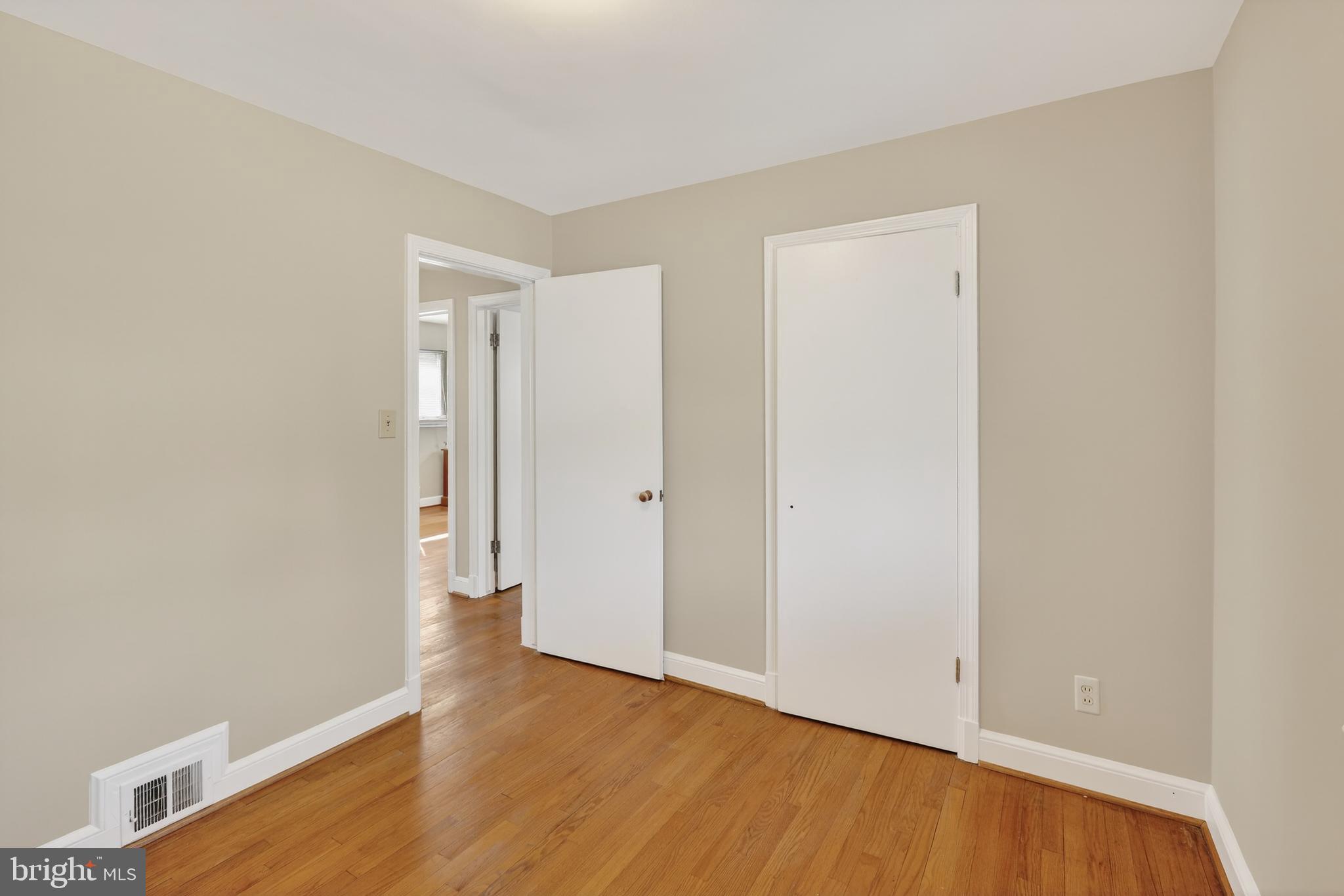6001 Dinwiddie Street Springfield, VA 22150 - Photo 18 of 42 a view of an empty room with wooden floor