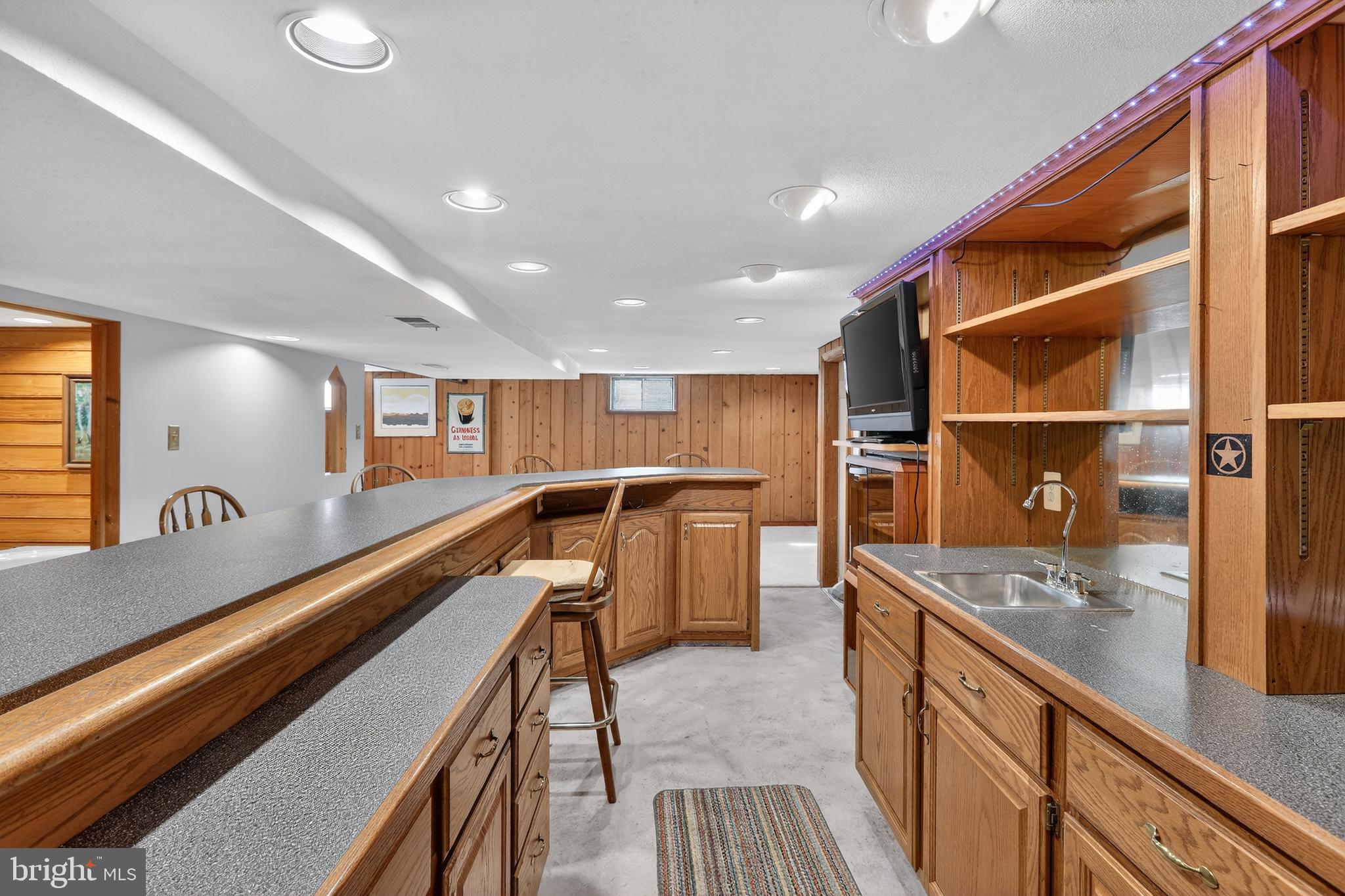 6001 Dinwiddie Street Springfield, VA 22150 - Photo 27 of 42 a view of a kitchen with a sink and dishwasher