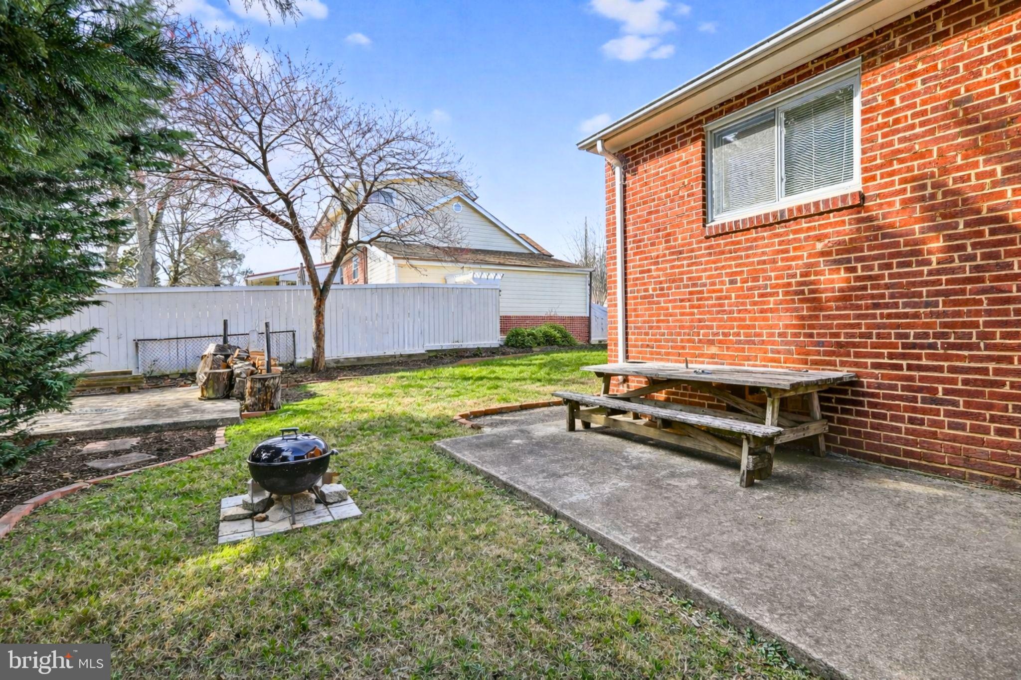 6001 Dinwiddie Street Springfield, VA 22150 - Photo 32 of 42 a view of a backyard with sitting area