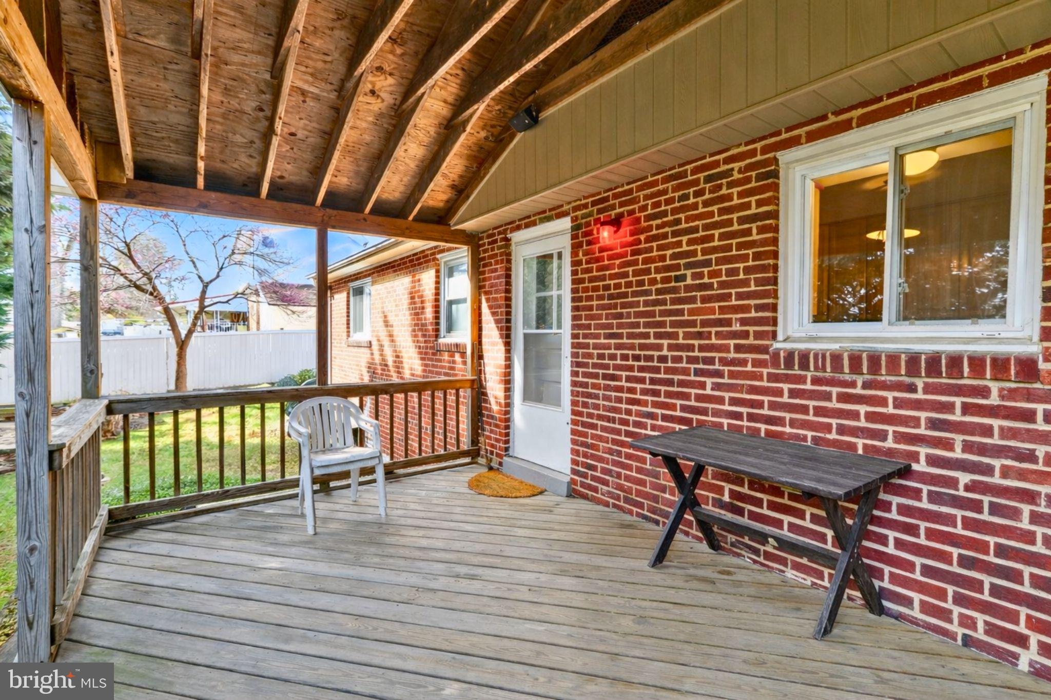 6001 Dinwiddie Street Springfield, VA 22150 - Photo 36 of 42 a view of a lounge chairs on the deck