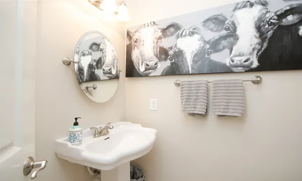 a bed room with a bed and a large window