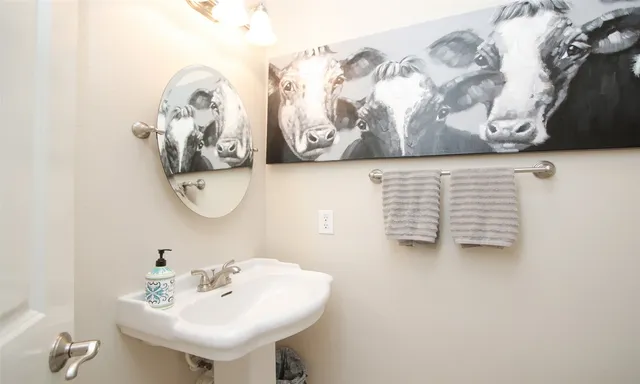 a bed room with a bed and a large window