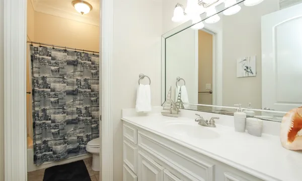 a outdoor space with lots of chairs and a chandelier