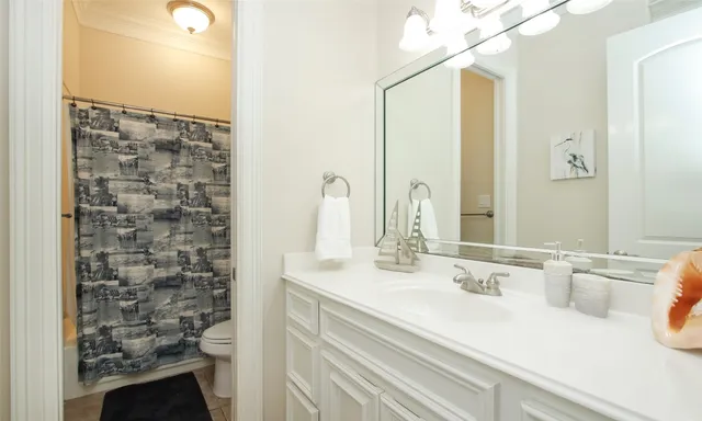 a outdoor space with lots of chairs and a chandelier