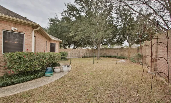 a view of swimming pool with outdoor seating and lake