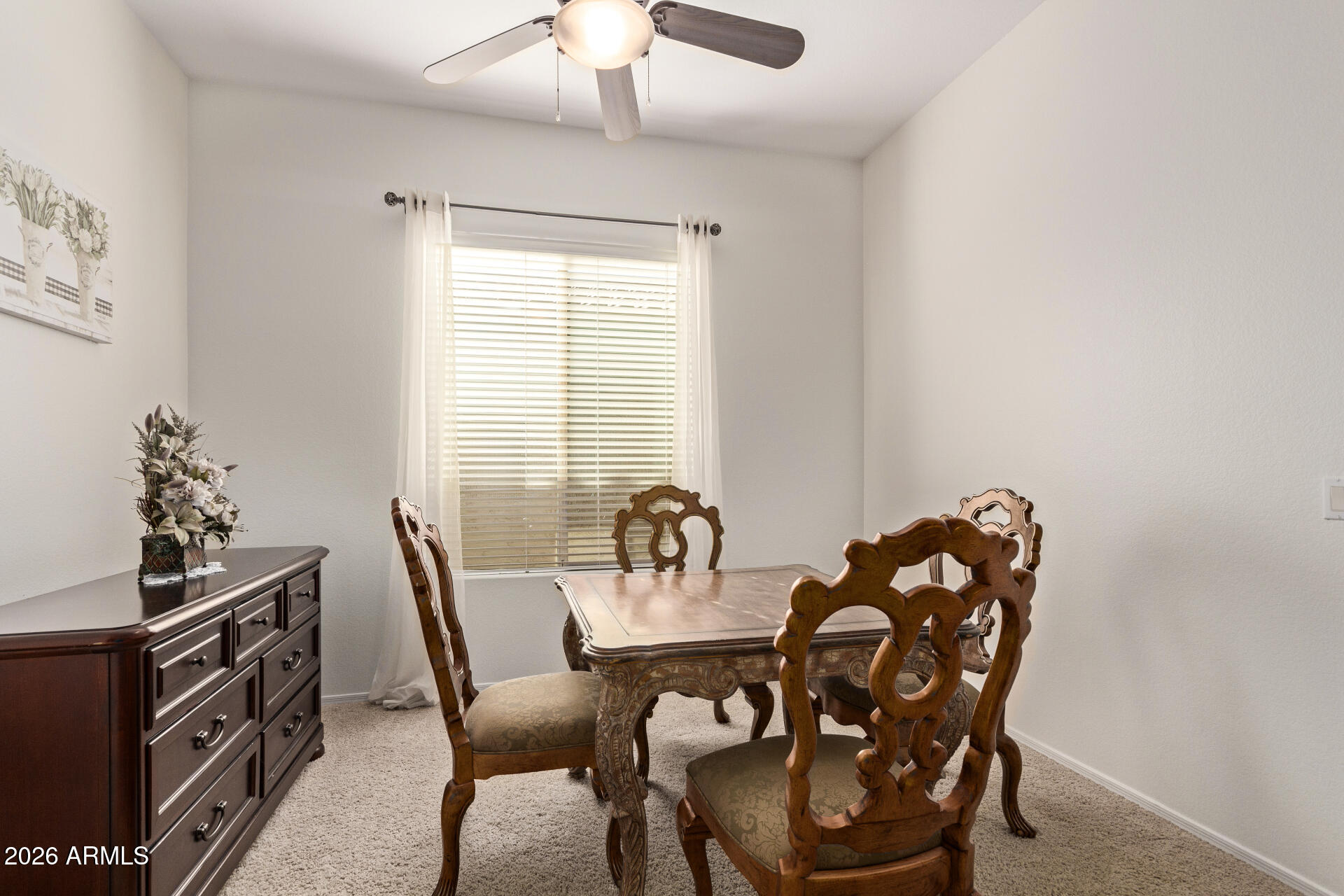 4120 East Jude Lane Gilbert, AZ 85298 - Photo 11 of 61 a dining room with furniture and window