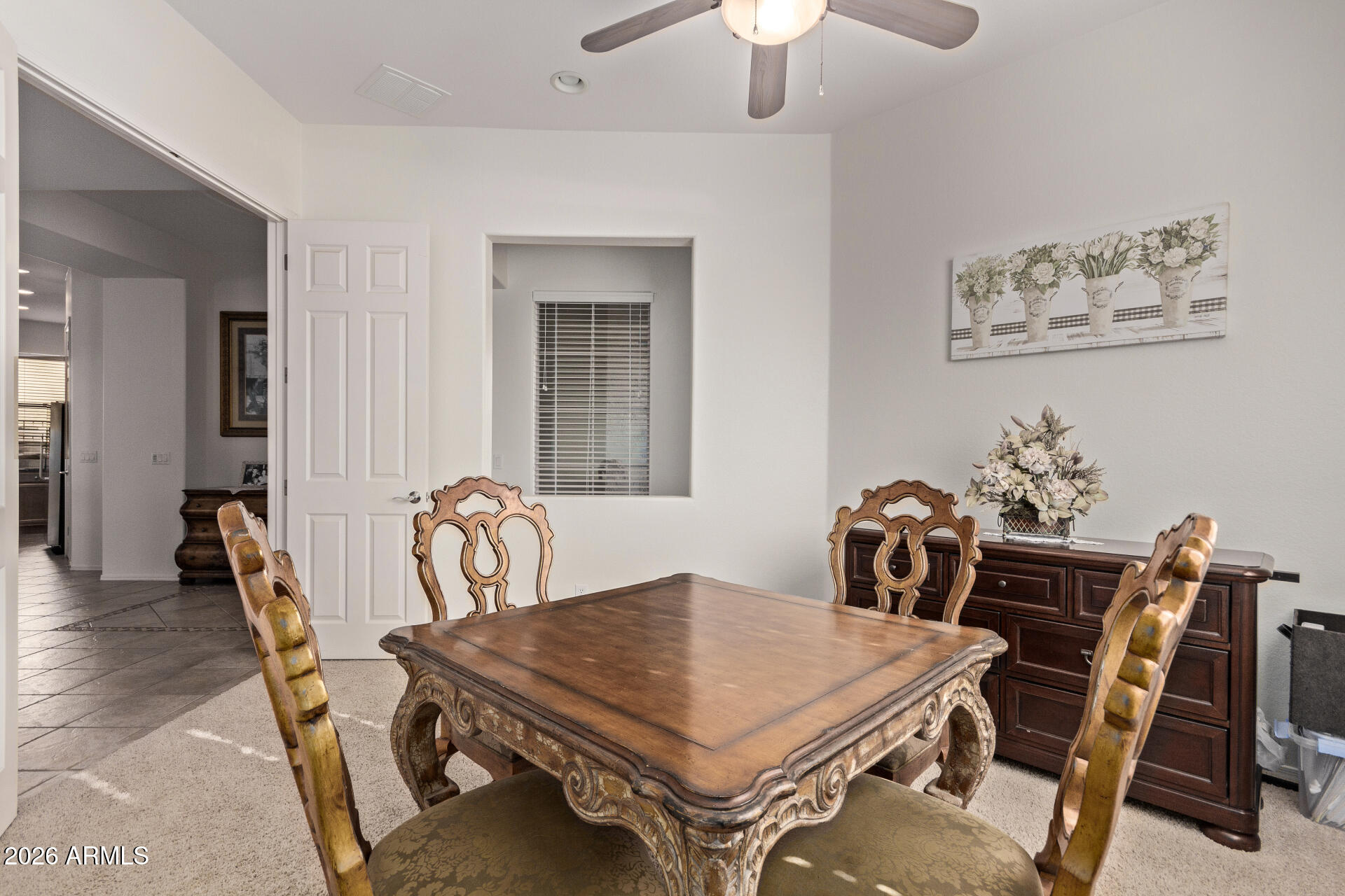 4120 East Jude Lane Gilbert, AZ 85298 - Photo 12 of 61 a view of a dining room with furniture