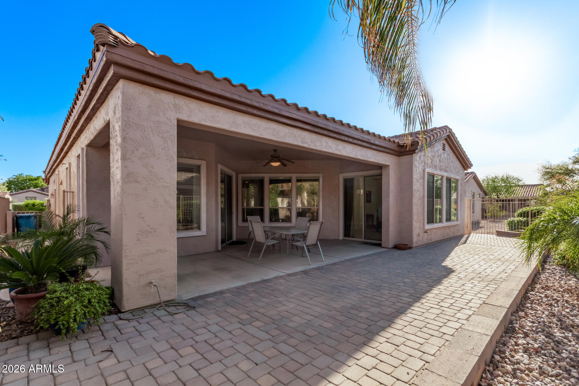4120 East Jude Lane Gilbert, AZ 85298 - Photo 27 of 61 a front view of a house with garden