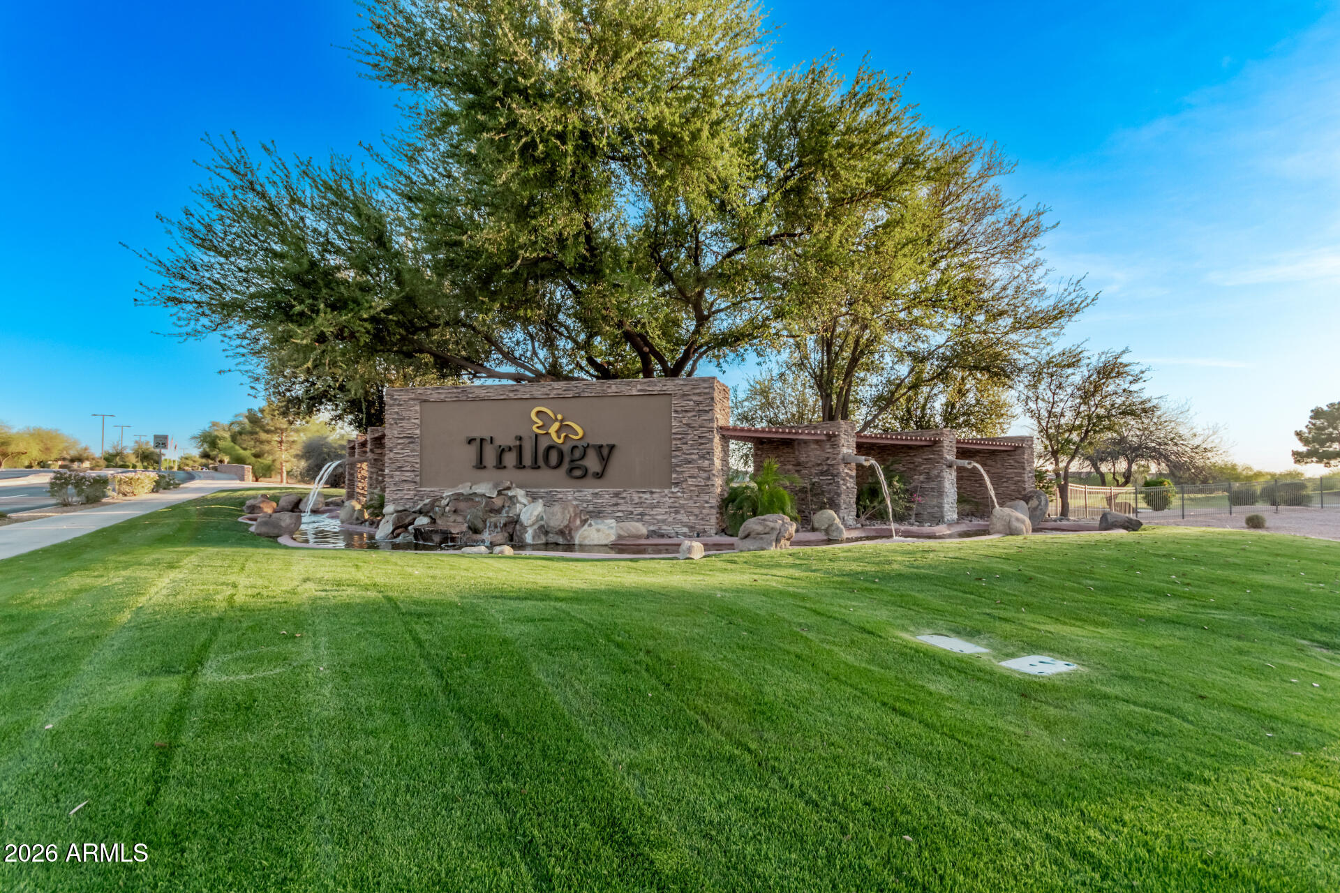 4120 East Jude Lane Gilbert, AZ 85298 - Photo 36 of 61 a view of a house with a big yard and large trees