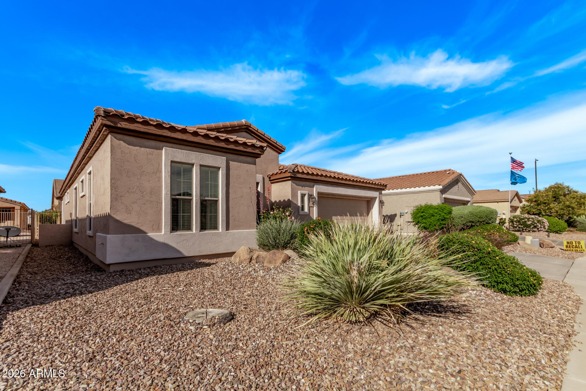 4120 East Jude Lane Gilbert, AZ 85298 - Photo 4 of 61 a view of a house with a yard