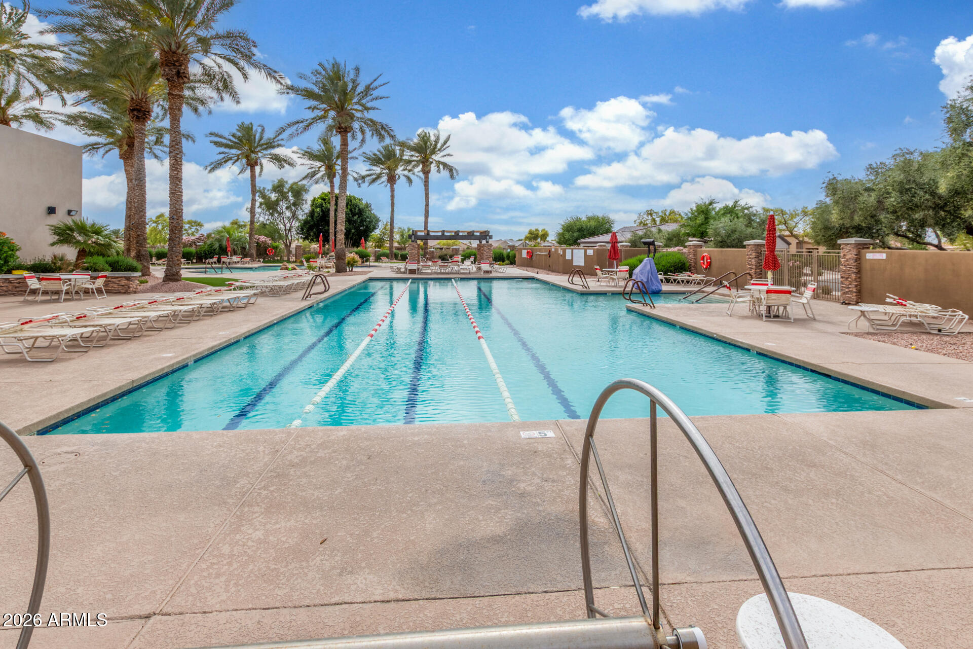 4120 East Jude Lane Gilbert, AZ 85298 - Photo 47 of 61 a view of swimming pool with a lounge chairs