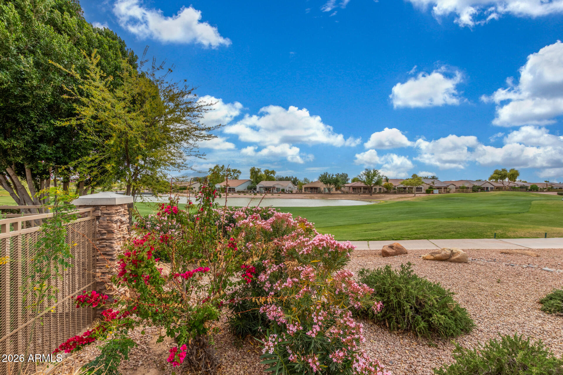 4120 East Jude Lane Gilbert, AZ 85298 - Photo 52 of 61 a view of a golf course with a lake view