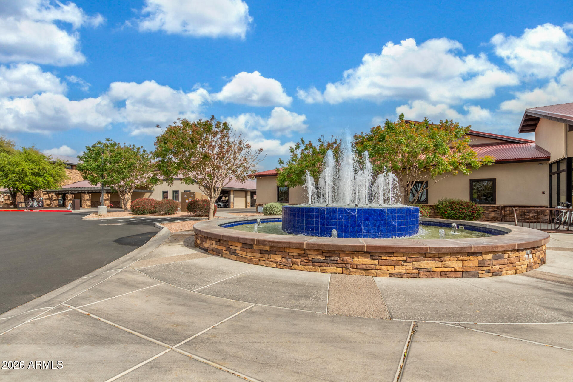 4120 East Jude Lane Gilbert, AZ 85298 - Photo 56 of 61 a view of a fountain in front of a building