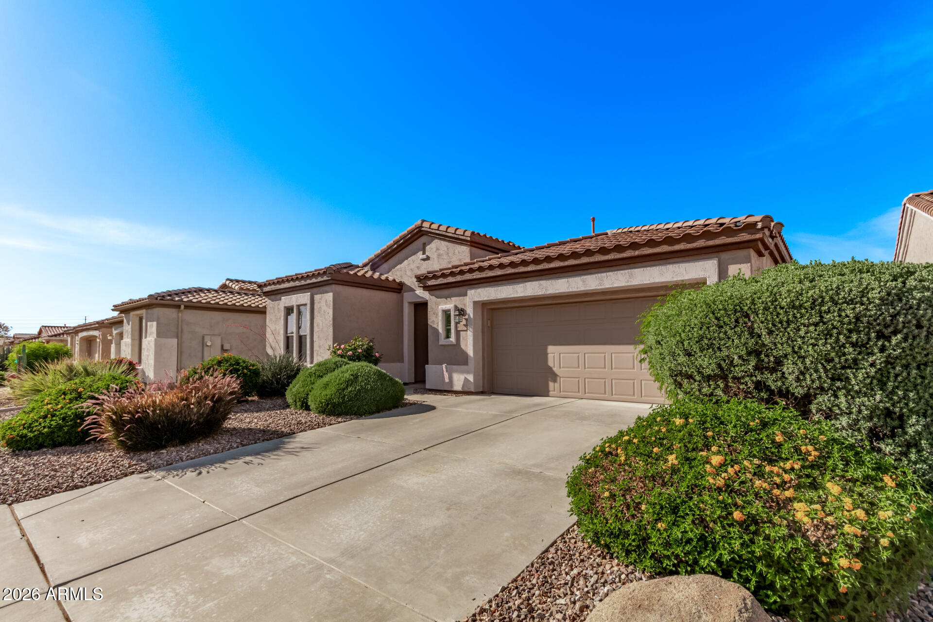 4120 East Jude Lane Gilbert, AZ 85298 - Photo 6 of 61 a front view of a house with a yard