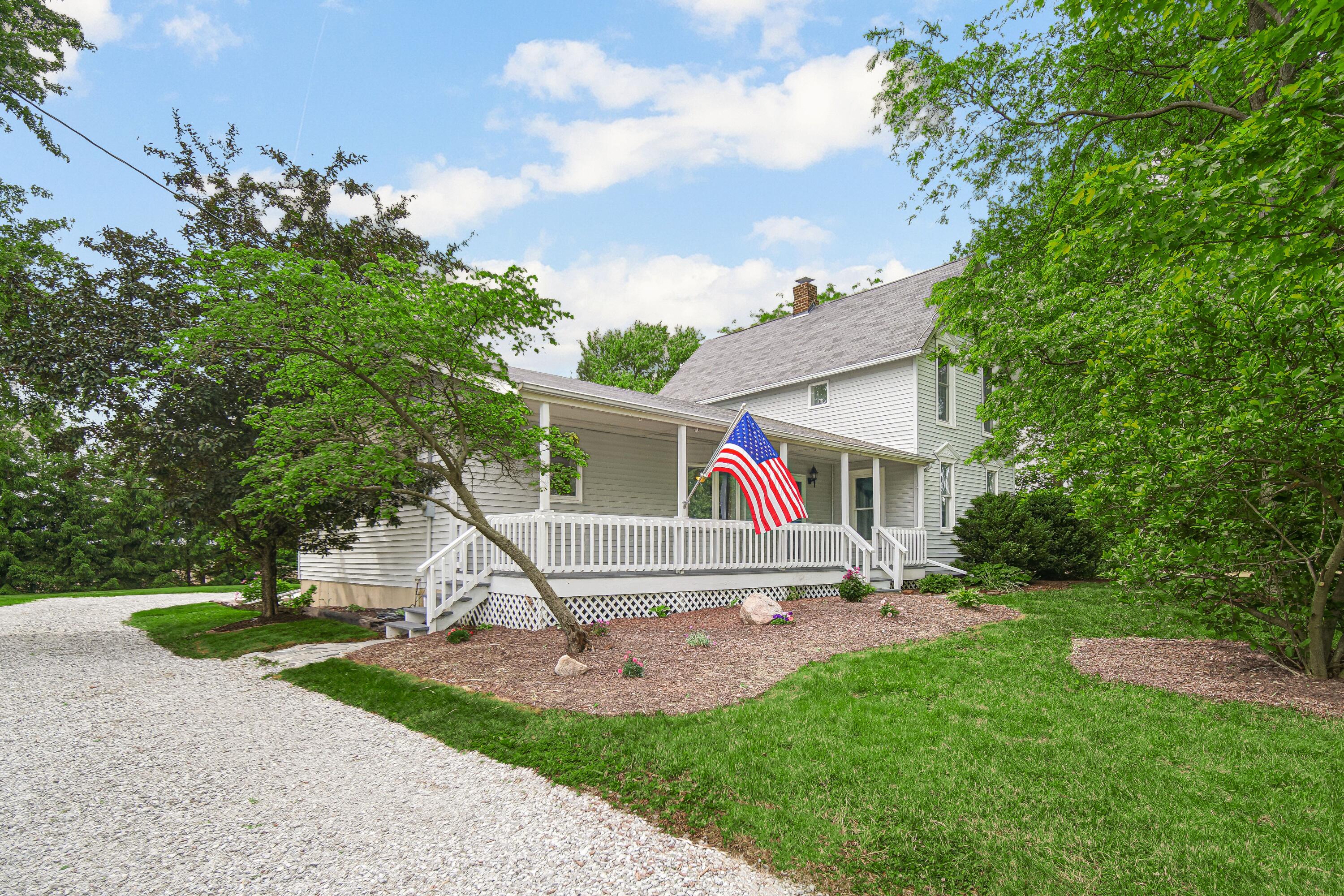476 Highway 2 Hebron, IN 46341 - Photo 2 of 25 a front view of house with yard and green space