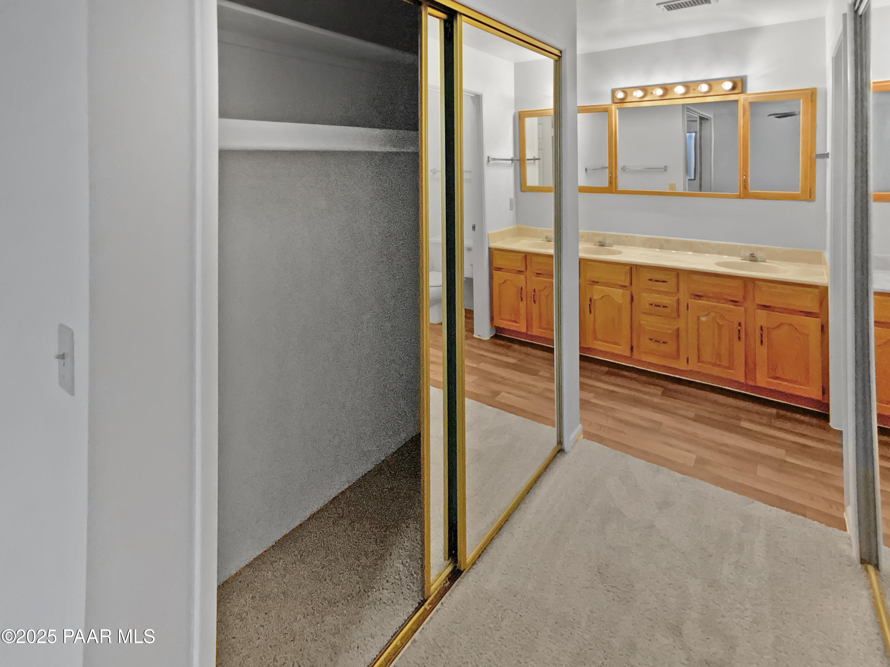 410 Apache Plume Trail Prescott, AZ 86301 - Photo 15 of 22 a view of walk in closet with empty racks