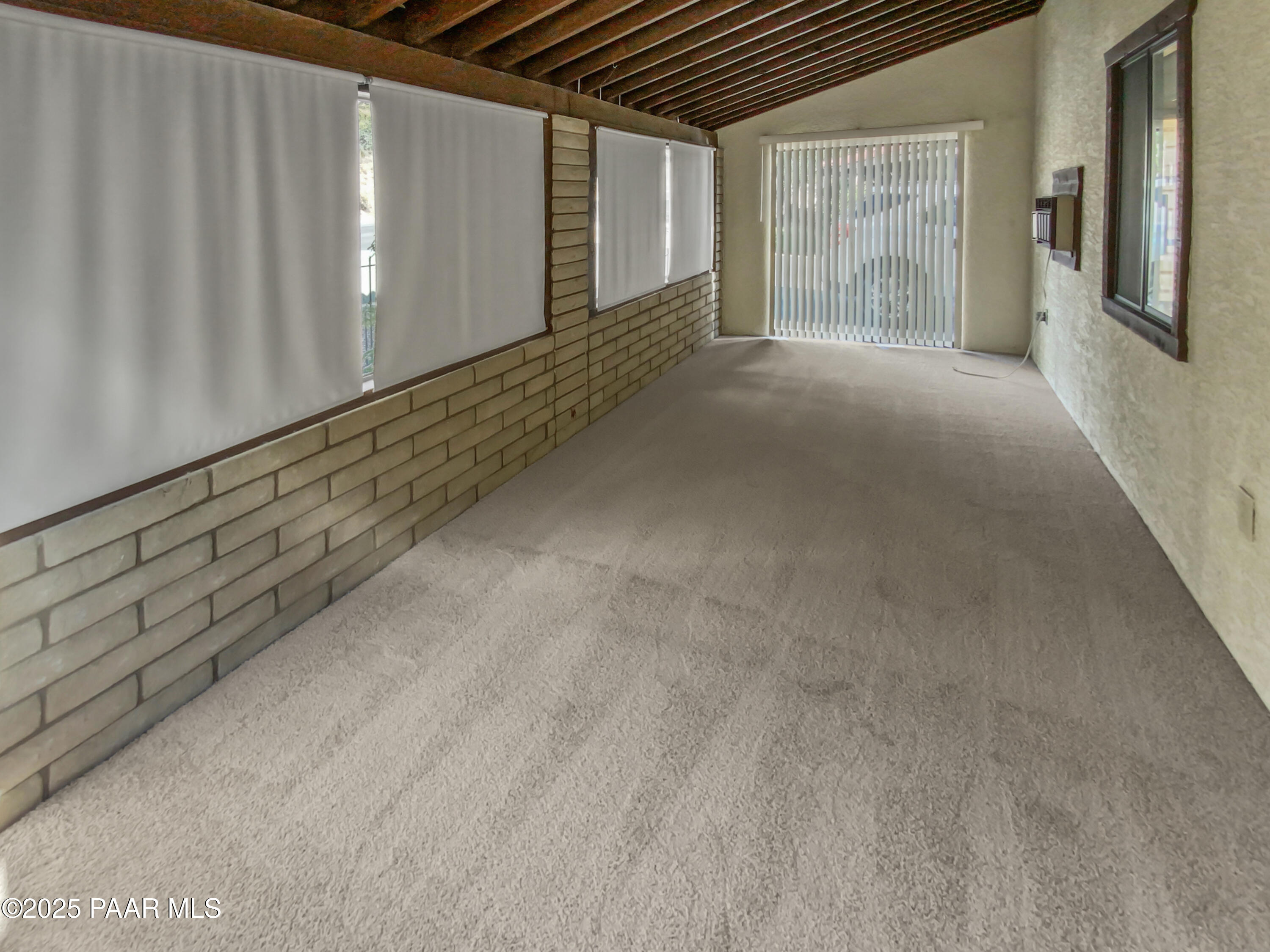 410 Apache Plume Trail Prescott, AZ 86301 - Photo 19 of 22 a view of an empty room with wooden floor