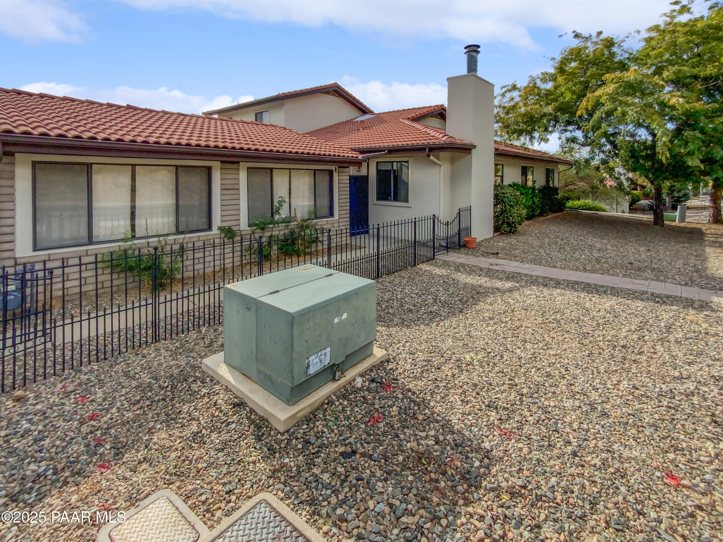 410 Apache Plume Trail Prescott, AZ 86301 - Photo 6 of 22 a front view of a house with a garden